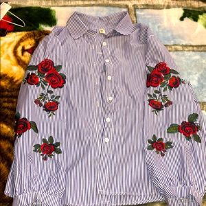 Shirt with stripes with patches